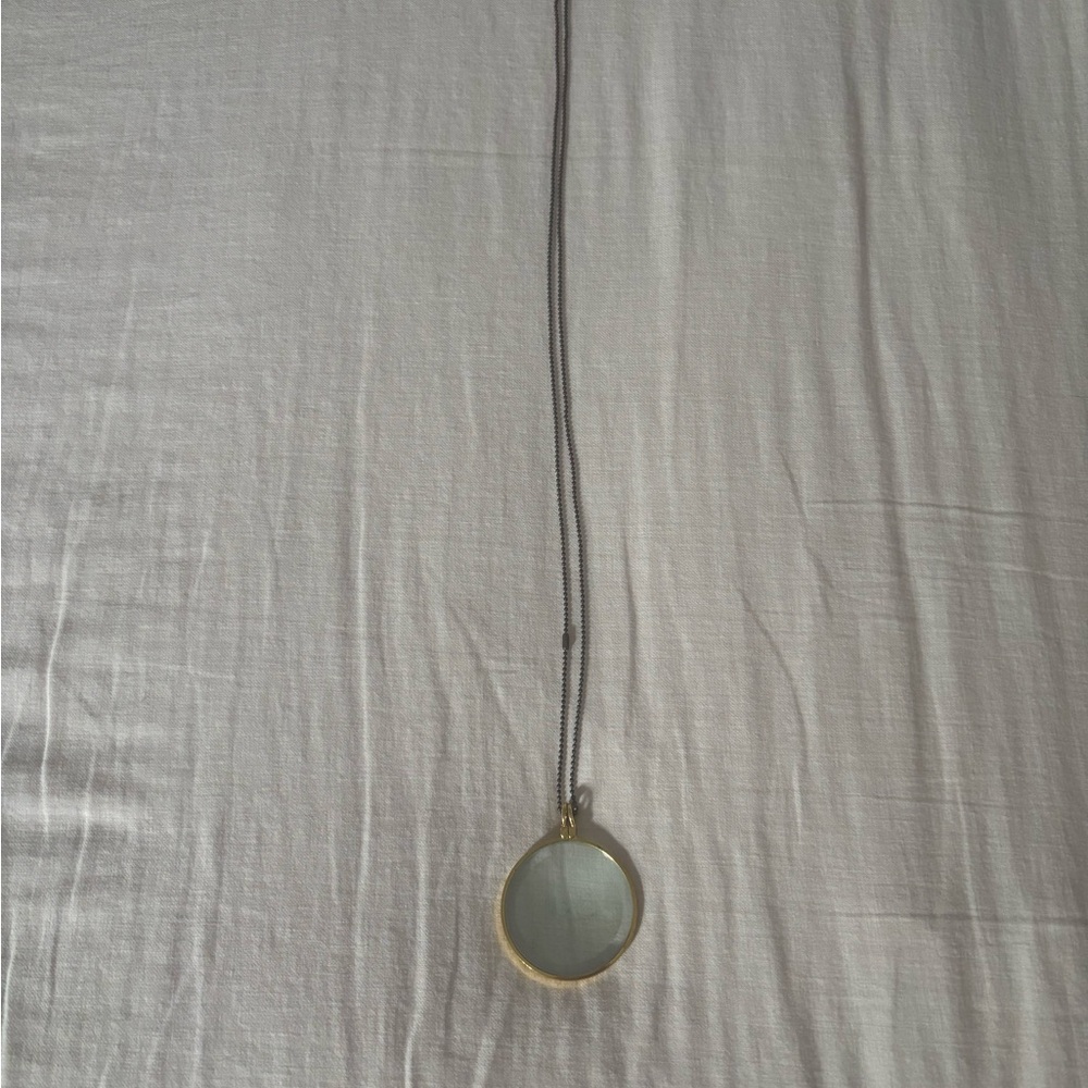 Elegant Gold and Silver Pendant Necklace